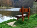 Romantic nook with wooden bench by the river