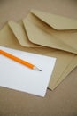 Romantic note and mail envelopes on a brown vintage table