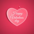 Romantic note from a paper heart with a pin. Festive graphic element. Happy Valentine`s Day. Pink background with a pattern of li Royalty Free Stock Photo