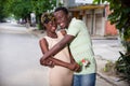 Young man offering a flowers to a beautiful woman