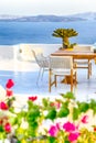 Romantic Open Air Cosy Terrace Restaurant in Beautiful Oia Village on Santorini Island in Greece Before the Sunset Royalty Free Stock Photo