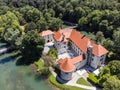 Romantic Otocec Castle on Krka River in Slovenia. Drone View.