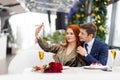 Romantic pastime of young caucasian couple in restaurant Royalty Free Stock Photo