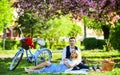 Romantic picnic. Couple cuddling on blanket. Happy together. My darling. Anniversary concept. Idyllic moment. Man and Royalty Free Stock Photo