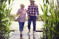 Romantic picnic.Senior couple at river enjoying together Royalty Free Stock Photo