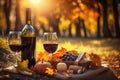 Romantic picnic with wine in autumn park. Created with Generative AI technology