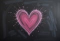 Romantic pink heart drawn on a chalkboard background Royalty Free Stock Photo