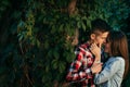 Romantic portrait of the young loving couple tenderly hugging. The girl is softly stroking the face of her boyfriend Royalty Free Stock Photo