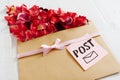 Romantic post message with flower petals, closeup Royalty Free Stock Photo