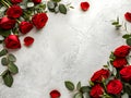 Romantic Red Roses and Eucalyptus Frame on Marble Background Royalty Free Stock Photo