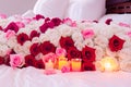 Romantic Red, White Roses on Bed Royalty Free Stock Photo