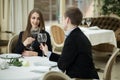 Romantic relationship concept - seducing beautiful woman looking at her lover with wine glass. Royalty Free Stock Photo