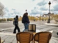 romantic restaurant terrace with view of Paris people on street