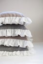 Romantic ruffled linen pillows stack isolated Royalty Free Stock Photo