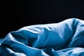 Romantic and sad feeling blue bed sheet background Royalty Free Stock Photo