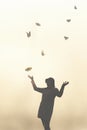 Romantic scene of a meeting between a woman and colorful butterflies