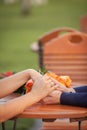 Romantic scene of woman`s hands in man`s hands.