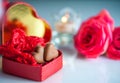 Romantic scenery with red heart-shaped box with chocolate hearts Royalty Free Stock Photo