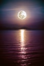 Romantic scenic with full moon on sea to night. Reflection of mo