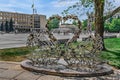 Romantic sculpture of two swans, hung with locks of lovers in Mykolaiv