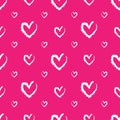Romantic seamless pattern with cute chalk images of hearts on a pink background