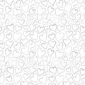 Romantic seamless pattern with cute images of hearts on a white background. The style of children`s drawing. Royalty Free Stock Photo