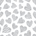 Romantic seamless pattern with cute images of hearts on a white background. The style of children`s drawing. Royalty Free Stock Photo