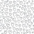 Romantic seamless pattern with cute images of hearts on a white background. The style of children`s drawing. Royalty Free Stock Photo