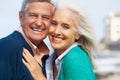 Romantic Senior Couple Hugging On Beach Royalty Free Stock Photo