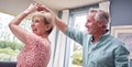 Romantic Senior Retired Couple Dancing In Lounge At Home Together Royalty Free Stock Photo