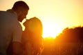 Romantic sensual young couple in love kissing at the sunset Royalty Free Stock Photo