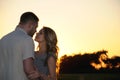 Romantic sensual young couple in love posing at the sunset Royalty Free Stock Photo