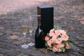 romantic set champagne flowers wine glasses outside