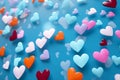 Romantic setting: Colorful hearts rain from white cloud on blue