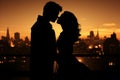 Romantic Silhouette. Couple Kissing in Vibrant Sunset in the city, Symbolizing Love and Affection Royalty Free Stock Photo