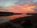 Romantic sky, dramatic colorful sunset over the sea background. Burning sky over horizon. Beautiful beach landscape view. Royalty Free Stock Photo