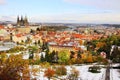 Romantic snowy colorful autumn Prague gothic Castle with St. Nicholas' Cathedral Royalty Free Stock Photo