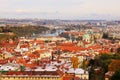 Romantic snowy colorful autumn Prague with St. Nicholas' Cathedral Royalty Free Stock Photo