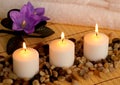 Romantic Spa Setting with Candles and Flowers Royalty Free Stock Photo