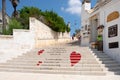 Romantic staircase with love phrases in Italian.