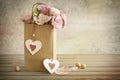 Romantic still life background with hand made hearts, vintage to Royalty Free Stock Photo