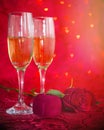 Romantic still life with champagne, gift box and red rose Royalty Free Stock Photo