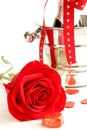 Romantic still life champagne, roses, gifts Royalty Free Stock Photo