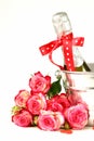 Romantic still life champagne, roses, gifts Royalty Free Stock Photo