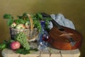 Romantic still life with fruit and a musical instrument Royalty Free Stock Photo