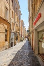 Romantic street in Aix-En-Provence, South of France with pedestrians and buildings Royalty Free Stock Photo