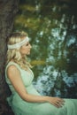 Romantic style woman portrait by the lake