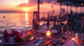 Romantic sunset dinner on the beach. Honeymoon and travel time Royalty Free Stock Photo