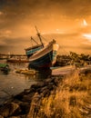 Romantic sunset with lonelly boat Royalty Free Stock Photo