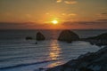 Romantic sunset over a rocky beach at Cyprus Royalty Free Stock Photo